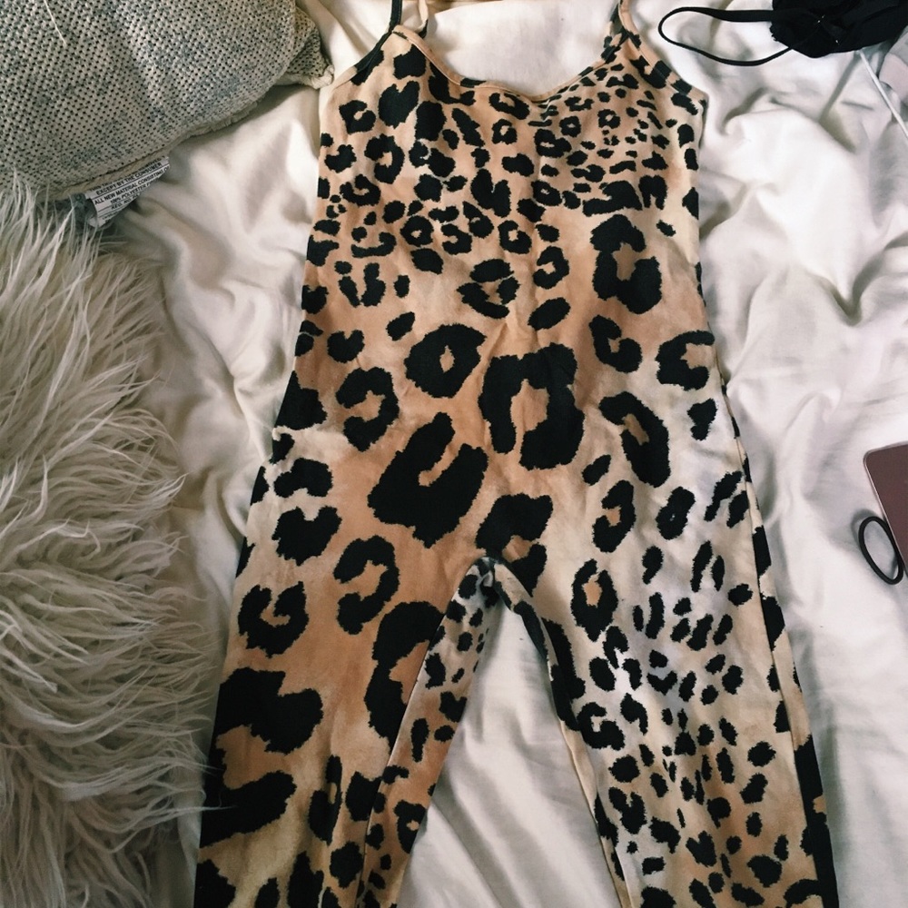 Full-length leopard body-suit.
